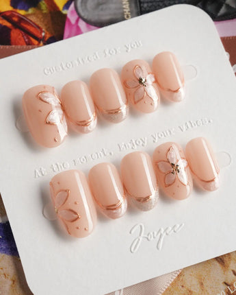 Haze Bloom press-on nails — Elegant Nude Pink, Embossed Florals & French Gold Edging. handmade nail art by Joyee Nails