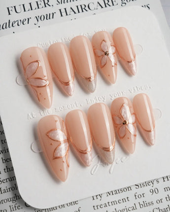 Haze Bloom press-on nails — Elegant Nude Pink, Embossed Florals & French Gold Edging. handmade nail art by Joyee Nails