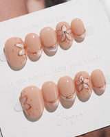 Haze Bloom press-on nails — Elegant Nude Pink, Embossed Florals & French Gold Edging. handmade nail art by Joyee Nails