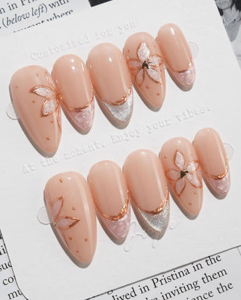 Haze Bloom press-on nails — Elegant Nude Pink, Embossed Florals & French Gold Edging. handmade nail art by Joyee Nails