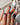 Heartbreaker press on nails with a 3D chrome snake, dagger, red heart in liquid silver and black rose silhouettes on nude with black tips - image 1