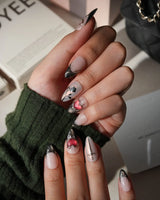 Heartbreaker press on nails with a 3D chrome snake, dagger, red heart in liquid silver and black rose silhouettes on nude with black tips - image 2