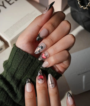 Heartbreaker press on nails with a 3D chrome snake, dagger, red heart in liquid silver and black rose silhouettes on nude with black tips - image 2