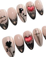 Heartbreaker press on nails with a 3D chrome snake, dagger, red heart in liquid silver and black rose silhouettes on nude with black tips - image 3