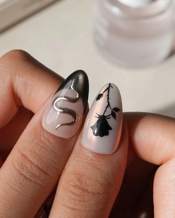Heartbreaker press on nails with a 3D chrome snake, dagger, red heart in liquid silver and black rose silhouettes on nude with black tips - image 4