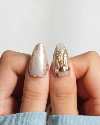 High Tea close-up of gold tableware charms on glossy medium almond nails
