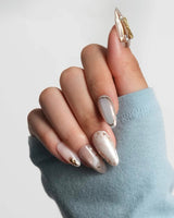High Tea English afternoon tea nail art with pearls, gold leaf, and fine gold lines