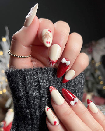 Holy night nail art close-up showing Festive Christmas, Gingerbread Man & Hearts. details