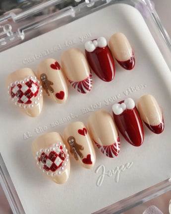 Holy night press-on nails in extra short almond shape — Festive Christmas, Gingerbread Man & Hearts.