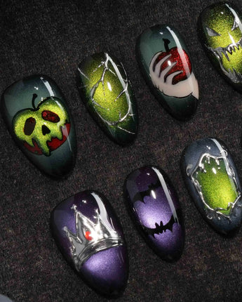 Poison Apple press on nails with a green skull poison apple, fanged grin, bat and 3D silver crown on green and purple cat eye - image 1