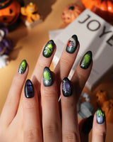 Poison Apple press on nails with a green skull poison apple, fanged grin, bat and 3D silver crown on green and purple cat eye - image 4