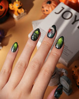 Poison Apple press on nails with a green skull poison apple, fanged grin, bat and 3D silver crown on green and purple cat eye - image 6