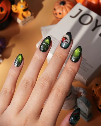 Poison Apple press on nails with a green skull poison apple, fanged grin, bat and 3D silver crown on green and purple cat eye - image 6