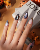 Black Rose Ball press on nails with black roses, a gold butterfly, pearls and a ghost in a gold frame on lilac violet pearl cat eye - image 2