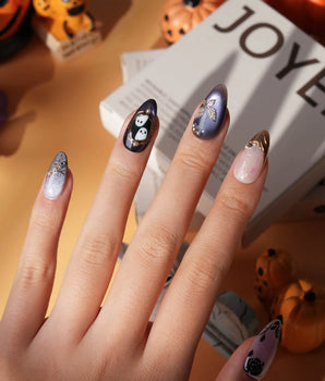 Black Rose Ball press on nails with black roses, a gold butterfly, pearls and a ghost in a gold frame on lilac violet pearl cat eye - image 2