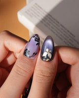 Black Rose Ball press on nails with black roses, a gold butterfly, pearls and a ghost in a gold frame on lilac violet pearl cat eye - image 4