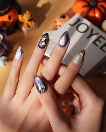 Black Rose Ball press on nails with black roses, a gold butterfly, pearls and a ghost in a gold frame on lilac violet pearl cat eye - image 5