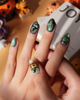 Witch's Cat press on nails with a black cat on a jack-o-lantern, witch hat, skulls, bats and a spider web on green shimmer cat eye - image 5