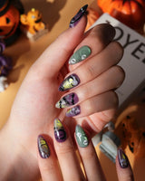Fright Night press on nails with a fanged black cat, bats, white skulls and spider webs on purple gold and green cat eye - image 5