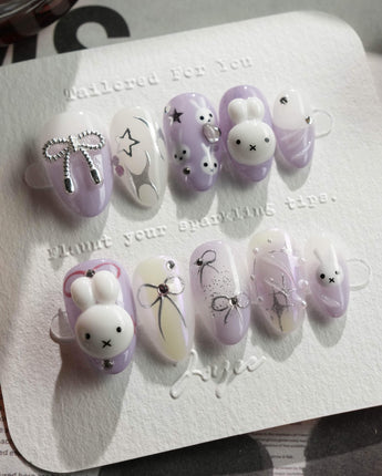 Icy Miffy-Purple press-on nails in extra short almond shape — Dreamy Purple, 3D Bunny & Silver Wire Bows.