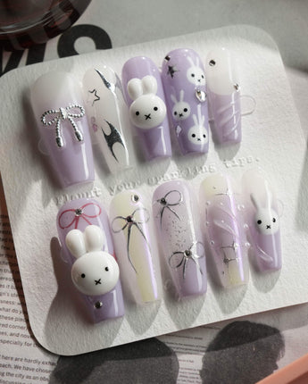 Icy Miffy-Purple press-on nails in long coffin shape — Dreamy Purple, 3D Bunny & Silver Wire Bows.