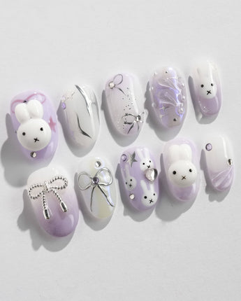 Icy Miffy-Purple press-on nails in short oval shape — Dreamy Purple, 3D Bunny & Silver Wire Bows.