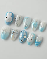 Icy Miffy press-on nails in extra short almond shape — Fresh Sky Blue, 3D Bunny & Silver Bows.
