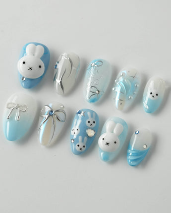 Icy Miffy press-on nails in extra short almond shape — Fresh Sky Blue, 3D Bunny & Silver Bows.