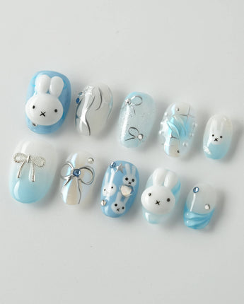 Icy Miffy press-on nails in extra short oval shape — Fresh Sky Blue, 3D Bunny & Silver Bows.
