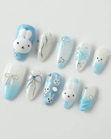 Icy Miffy press-on nails in medium almond shape — Fresh Sky Blue, 3D Bunny & Silver Bows.