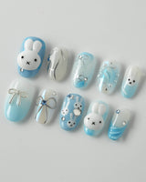 Icy Miffy press-on nails in short oval shape — Fresh Sky Blue, 3D Bunny & Silver Bows.
