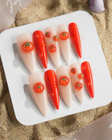 Icy Tomato custom press-on nails with crystal shine and playful tomato accents