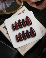 Inferno spotlight cat eye press on nails, near-black red with a long bright red magnetic glow - image 2