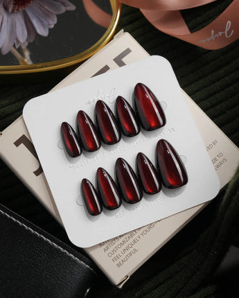 Inferno spotlight cat eye press on nails, near-black red with a long bright red magnetic glow - image 2