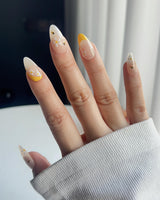 BeeBee Nails handmade press-on nails featuring Daisy & Bee, Yellow French.
