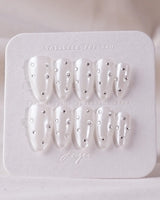 Glitz Galore press-on nail set — milky white rhinestone nails design, hand-painted with real gel polish