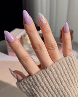 Flower Sea handmade press-on nails featuring  Lavender chrome and Hand-painted White Florals