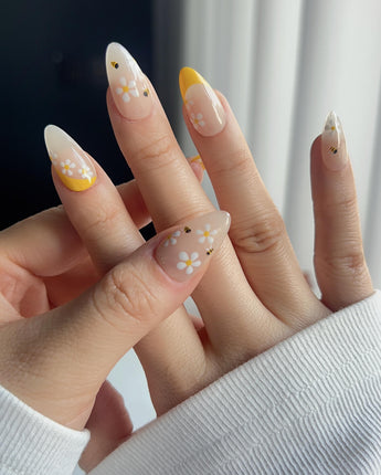 BeeBee Nails nail art close-up showing Daisy & Bee, Yellow French. details