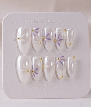 Garden Party press-on nail set — minimal floral french tip design, hand-painted with real gel polish