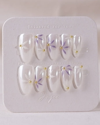 Garden Party press-on nail set — minimal floral french tip design, hand-painted with real gel polish