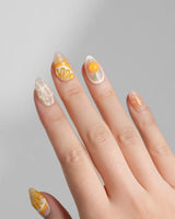 Juicy Juicy extra short almond custom-size press-on nails with bright orange slices