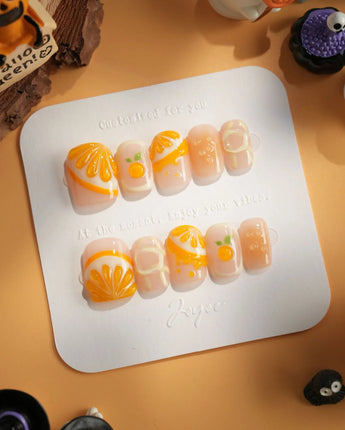 Juicy Juicy hand-painted summer orange nails with dimensional fruit accents