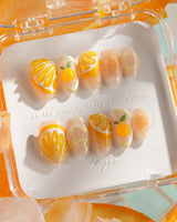 Juicy Juicy glossy orange jelly press-on nails with 3D citrus slices and peel texture