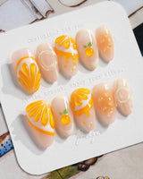 Juicy Juicy bright orange fruit nails with 3D citrus slice details