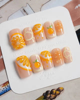 Juicy Juicy handmade citrus nail art with sparkling orange jelly finish