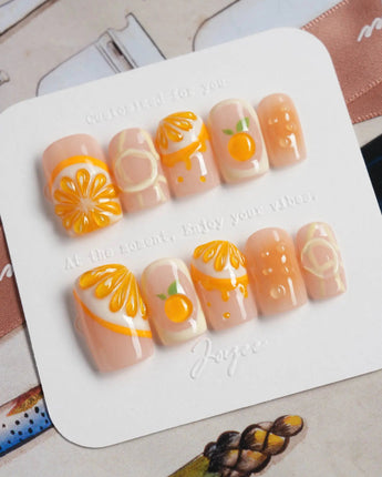 Juicy Juicy handmade citrus nail art with sparkling orange jelly finish