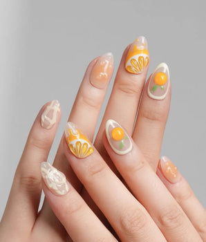 Juicy Juicy extra short almond press-on nails with translucent orange fruit art