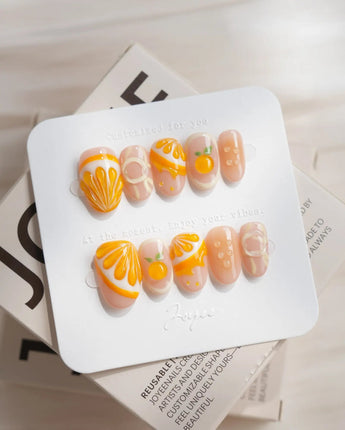 Juicy Juicy orange fruit press-on nails in short oval shape