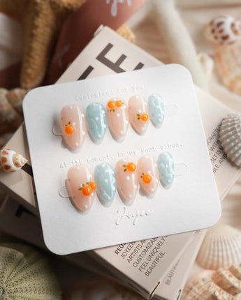Juicy Summer orange citrus press-on nails in extra short almond shape