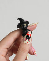Kiki’s Enchanted Picnic nail art close-up showing Pastel Multicolor, Hand-painted Cat & Bow. details